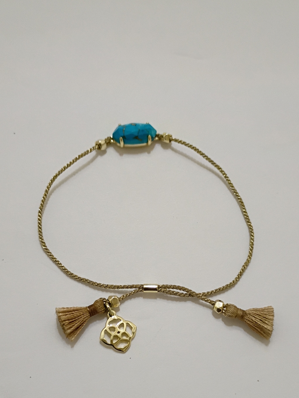 Kendra Scott Gold  Bracelet with Turquoise Stone and Tassel Charm